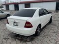 2002 Toyota Corolla IX (E120, E130), белый, 385000 рублей - вид 2