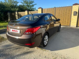 2016 Hyundai Solaris I Рестайлинг, коричневый, 890000 рублей, вид 4