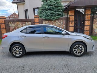 2014 Toyota Corolla XI (E160, E170, E180), серебристый, 1200000 рублей, вид 2