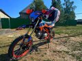 2023 Kayo Evolution YX140EM, оранжевый, 100000 рублей