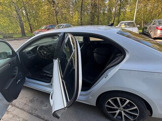 2017 Volkswagen Jetta VI Рестайлинг, серый, 1230000 рублей, вид 4