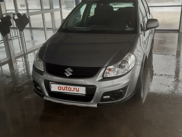2012 Suzuki SX4 I (Classic) Рестайлинг, серый - вид 1