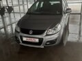2012 Suzuki SX4 I (Classic) Рестайлинг, серый - вид 1