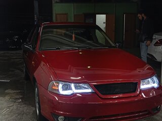 2010 Daewoo Nexia I Рестайлинг, пурпурный, 340000 рублей, вид 2