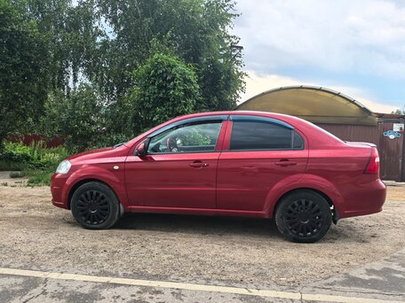 2011 Chevrolet Aveo I Рестайлинг, красный, 350000 рублей, вид 4