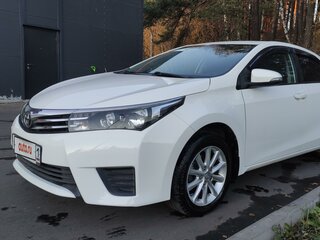 2014 Toyota Corolla XI (E160, E170, E180), белый, 1950000 рублей, вид 3