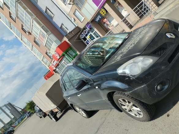 2011 Renault Koleos I, чёрный, 950000 рублей - вид 3