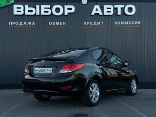 2012 Hyundai Solaris I, чёрный, 699000 рублей, вид 4