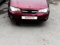 2012 Daewoo Nexia I Рестайлинг, пурпурный, 140000 рублей - вид 4