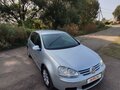 2004 Volkswagen Golf V, серебристый - вид 1