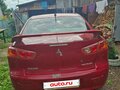 2007 Mitsubishi Lancer X, красный, 550000 рублей - вид 1