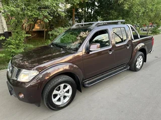 2010 Nissan Navara (Frontier) III (D40) Рестайлинг, серый, 1765000 рублей, вид 1