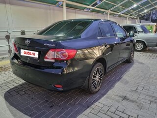 2010 Toyota Corolla X (E140, E150) Рестайлинг, чёрный, 1140000 рублей, вид 3