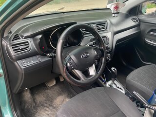 2014 Kia Rio 6-speed III, зелёный, 910000 рублей, вид 5