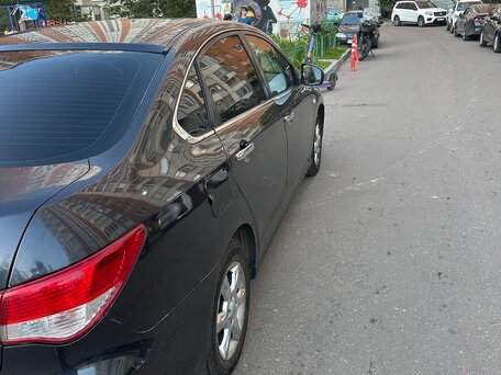 2013 Nissan Almera III (G15), чёрный, вид 3