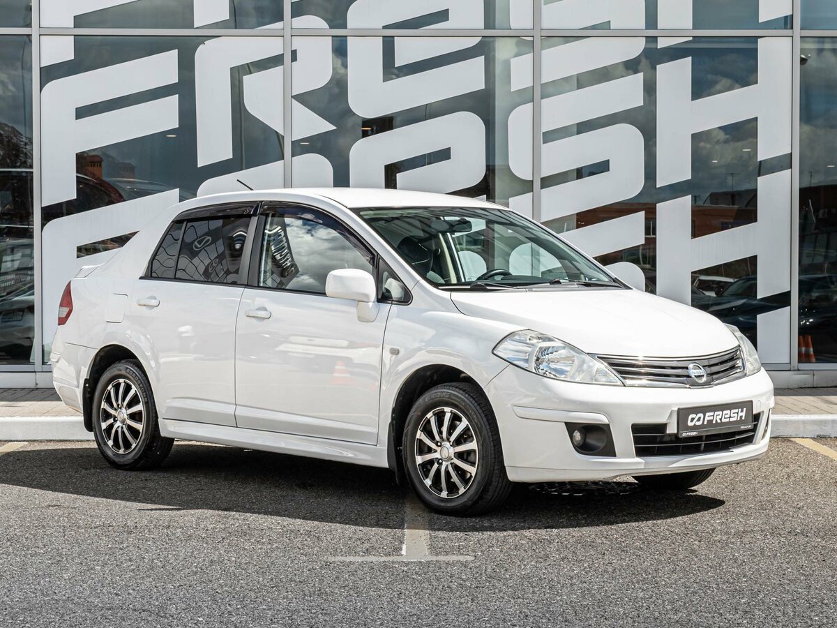 Открыть фотографии: Nissan Tiida I Рестайлинг