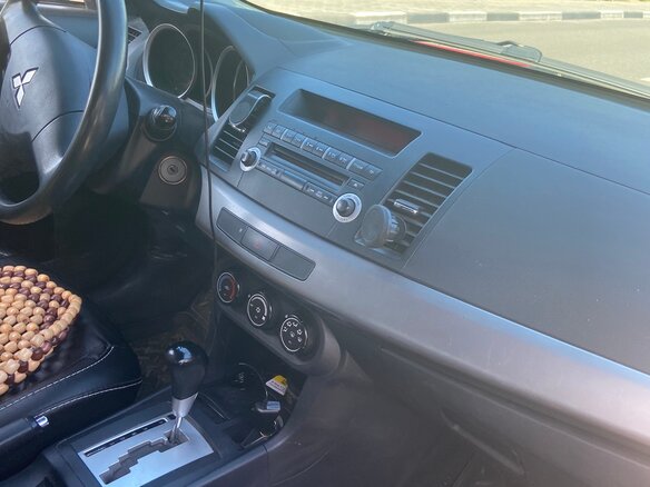 2011 Mitsubishi Lancer X Рестайлинг, красный, 650000 рублей - вид 11