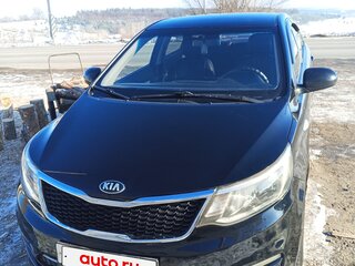 2015 Kia Rio III Рестайлинг, чёрный, 840000 рублей, вид 2
