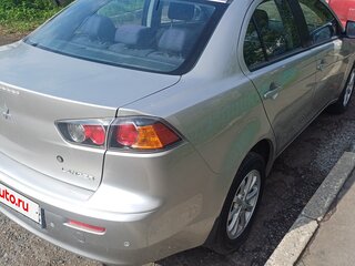 2012 Mitsubishi Lancer X Рестайлинг, серебристый, 950000 рублей, вид 4