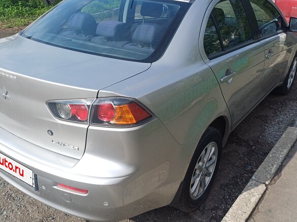 2012 Mitsubishi Lancer X Рестайлинг, серебристый, 950000 рублей - вид 3
