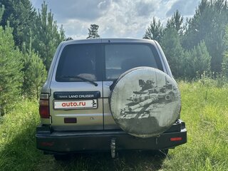 2002 Toyota Land Cruiser 105 100 Series Рестайлинг 1, серый, 2500000 рублей, вид 4