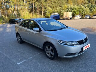 2010 Kia Cerato 5-speed II, серебристый, 629000 рублей, вид 2