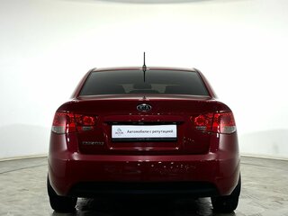 2012 Kia Cerato 6-speed II, красный, 1135000 рублей, вид 3