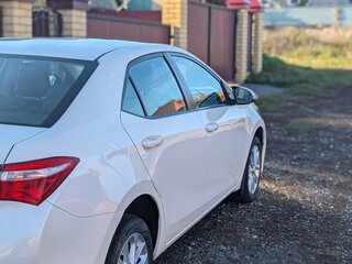 2014 Toyota Corolla XI (E160, E170, E180), белый, 1350000 рублей, вид 2