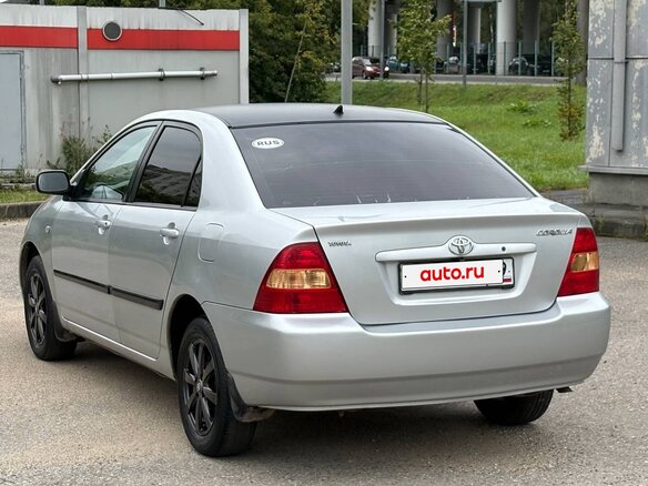 2002 Toyota Corolla IX (E120, E130), серый - вид 5