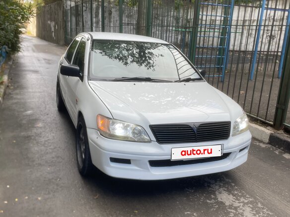 2000 Mitsubishi Lancer Cedia IX, белый, 230000 рублей - вид 4