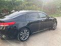 2016 Kia Optima IV, чёрный, 1330000 рублей - вид 1