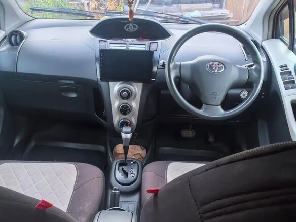 2005 Toyota Vitz II (XP90), оранжевый, 510000 рублей - вид 15