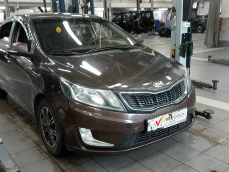 2014 Kia Rio 6-speed III, коричневый, 480000 рублей, вид 2