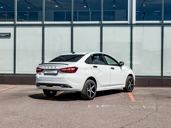 2023 Lada (ВАЗ) Vesta I Рестайлинг (NG), белый - вид 1