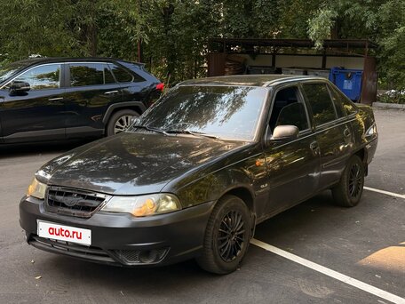 2011 Daewoo Nexia I Рестайлинг, чёрный, 125000 рублей, вид 1