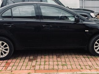 2010 Mitsubishi Lancer X, чёрный, 800000 рублей, вид 2