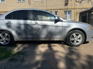 2011 Mitsubishi Lancer X Рестайлинг, белый, 419000 рублей, вид 4