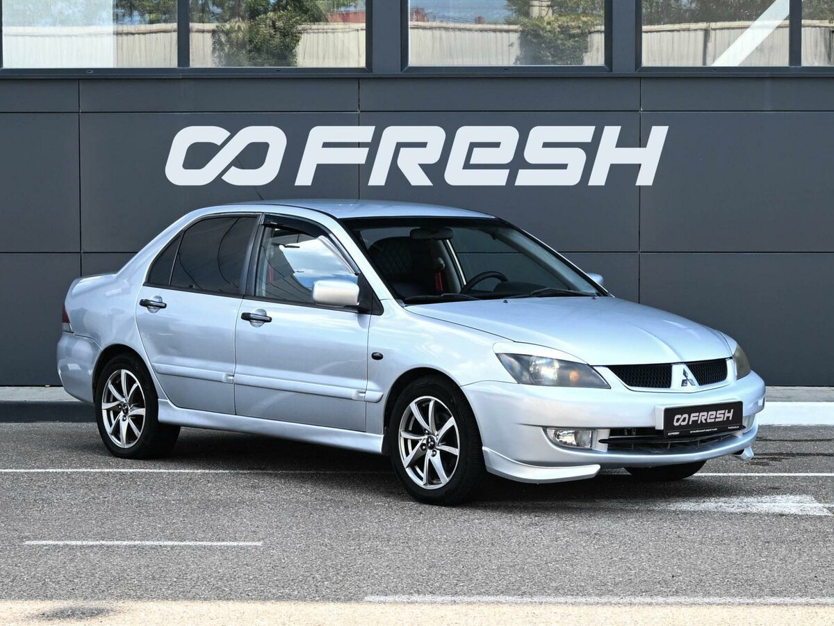 Открыть фотографии: Mitsubishi Lancer IX
