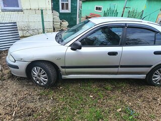 2003 Mitsubishi Carisma I Рестайлинг, серебристый, 180000 рублей, вид 4
