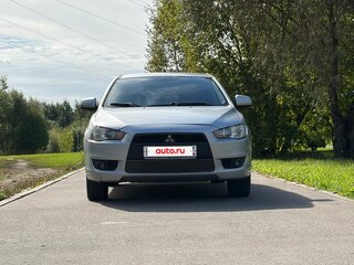 2010 Mitsubishi Lancer X, серебристый, 629000 рублей, вид 2