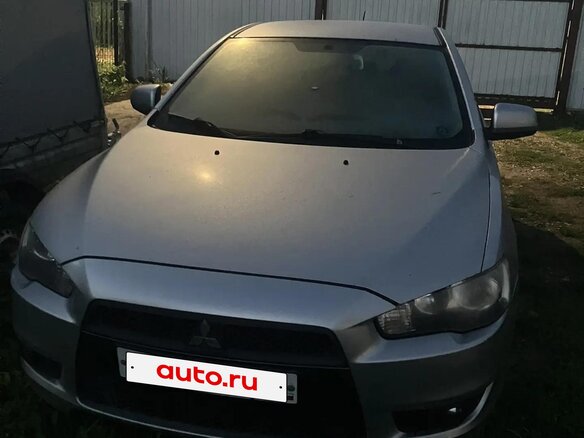 2010 Mitsubishi Lancer X, серебристый