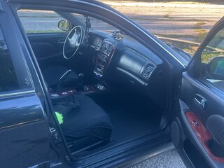 2007 Hyundai Sonata ТагАЗ IV (EF) Рестайлинг, чёрный, 650000 рублей, вид 5