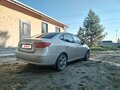 2010 Hyundai Elantra IV (HD), бежевый, 575000 рублей - вид 2