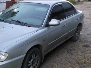 2007 Kia Spectra I Рестайлинг 2, белый, 335000 рублей, вид 4