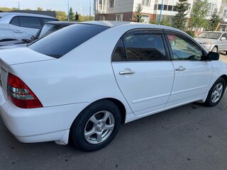 2004 Toyota Corolla IX (E120, E130) Рестайлинг, белый, 600000 рублей, вид 4