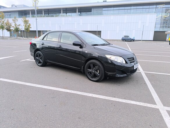 2008 Toyota Corolla X (E140, E150), чёрный, 950000 рублей - вид 1