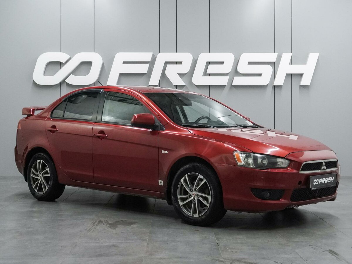 Открыть фотографии: Mitsubishi Lancer X