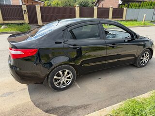 2014 Kia Rio 6-speed III, чёрный, 950000 рублей, вид 3