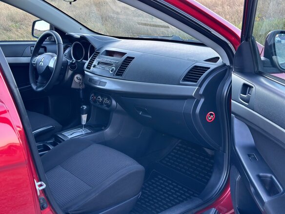 2007 Mitsubishi Lancer X, красный - вид 15