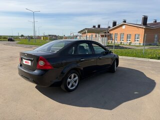 2010 Ford Focus II Рестайлинг, чёрный, 455555 рублей, вид 2